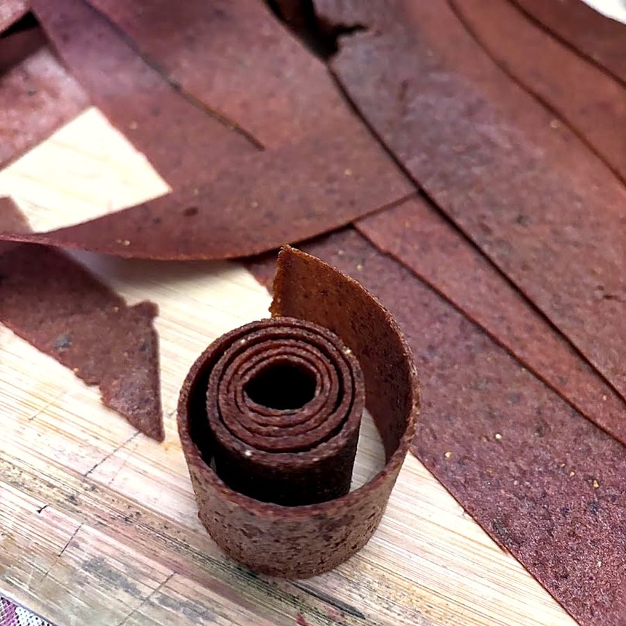 Our fruit leather cut into strips and rolled